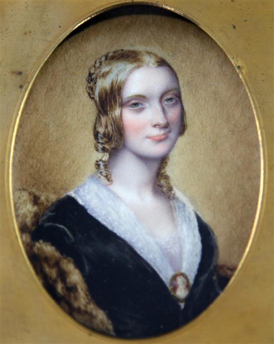 Henry Collen (1798-1872) Miniature of a young lady wearing a cameo brooch,